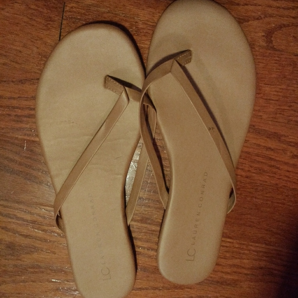 Tan/beige flip flops